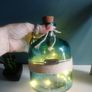 teal glass bottle with lights Image 4