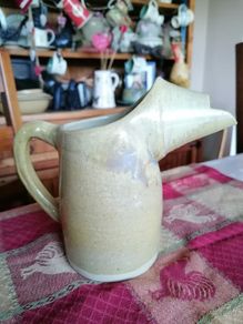 Glazed pottery milk or water jug