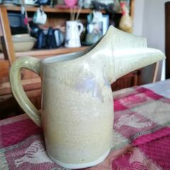 Glazed pottery milk or water jug