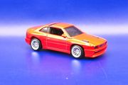 Hot Wheels Maserati Shamal with custom wheels.