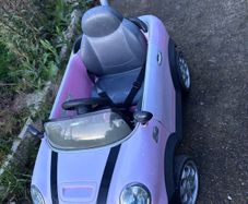 Kids pink ride in mini