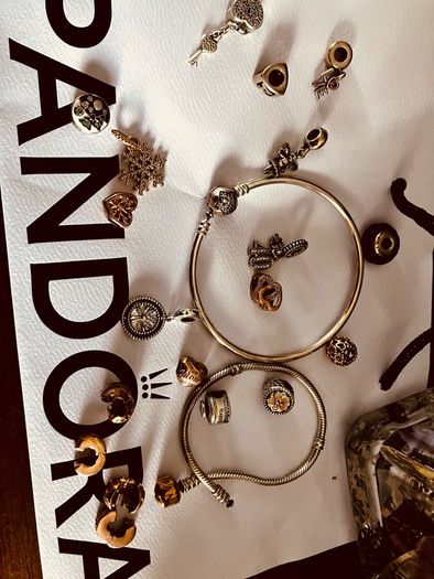 Assorted pandora charms and bracelets