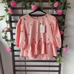peplum top puff sleeve embroidered top in the style brand size 12 100% cotton peach top