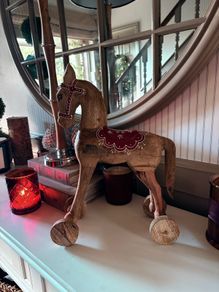New vintage inspired 45cm high hand carved horse on wheels with washed wood finish