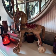 New vintage inspired 45cm high hand carved horse on wheels with washed wood finish