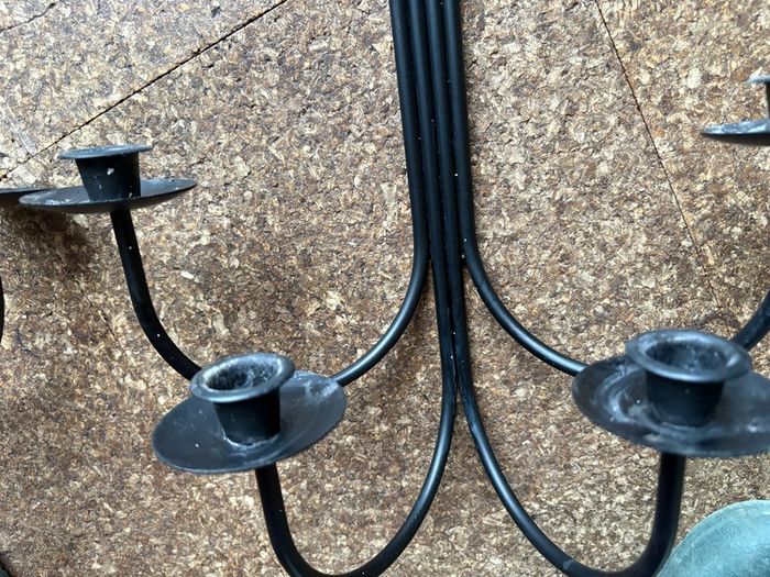 Pair of black metal wall sconces