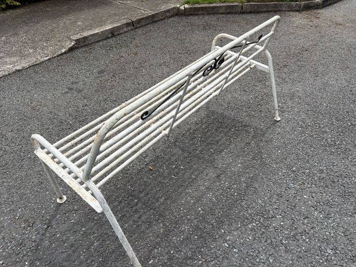 A matching pair of vintage tubalar steel garden benchs c1950