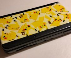 New Nintendo 3ds black with Pikachu plates