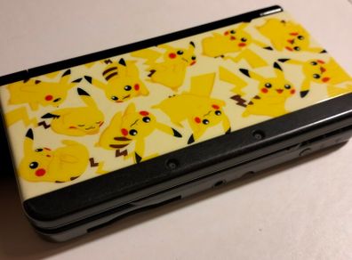 New Nintendo 3ds black with Pikachu plates
