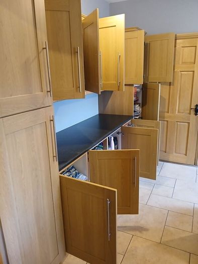 12 Kitchen / Utility room cabinets and Counter top