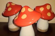 3 heavy, tall pottery mushrooms