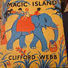 Magic Island written and illustrated by Clifford Webb and published in 1956 by Frederick Warne & Co. Hardback in fair condition.  See photos for same.