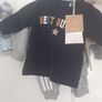 Baby boy bundle 0-3 months .All new with tags .Addidas tracksuit Name it top Dunnes hat and gloves Pack of 7 socks .Pack of 2 pair of rattle socks plus free summer hat new and green cable knit jumper all new 17 euro the lot Image 3