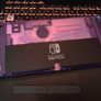 Nintendo Switch OLED (Clear Atomic Purple) Image 7