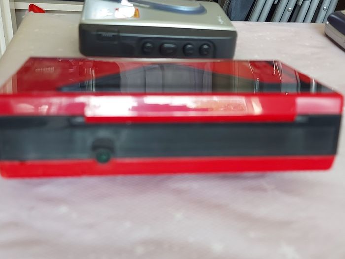 Sony Walkman and Sanyo AM-FM Stereo cassette Player, excellent cosmetic condition, no cables or batteries
