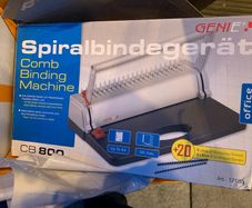 Comb binding Machine
