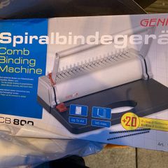 Comb binding Machine