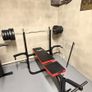 Gym bench, bar and weights. Image 2