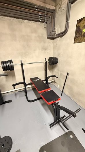 Gym bench, bar and weights.
