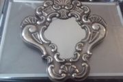 a sterling silver  mirror