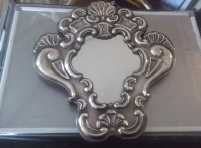 a sterling silver  mirror