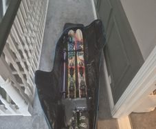 Twin tip skis,boots,polls,travel roller bag
