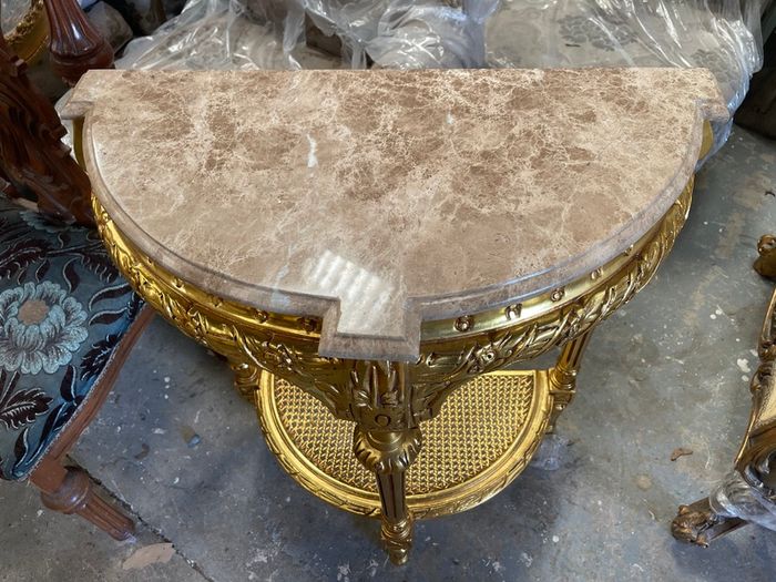 Carved wood gilt console table