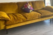 Mustard yellow velvet sofa