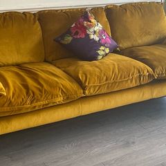 Mustard yellow velvet sofa
