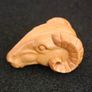 Carved wooden rams head. Image 4