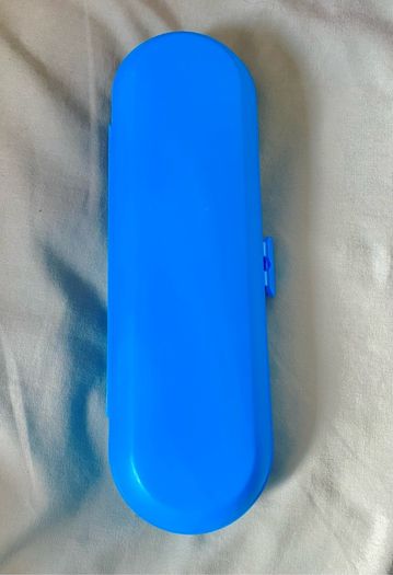 bright blue hard plastic electric toothbrush travel case (holds 1 handle and 2 brush heads) in clean, excellent condition