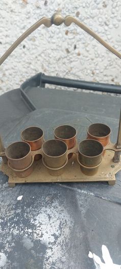vintage copper ,brass shot rack ,,unusual,,see pictures for condition, used condition, needs a clean ,sold as seen buyer collects or pays postage thank you
