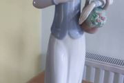 Vintage Porcelain Girl Holding Basket Figurine