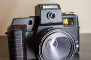 PANTIUM Film camera with flash and original camera bag.