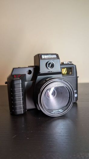 PANTIUM Film camera with flash and original camera bag.