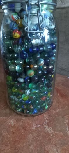 Antique collection of old marbles in large clip sealed jar it's full to the top loft find from very old house in France Beautiful