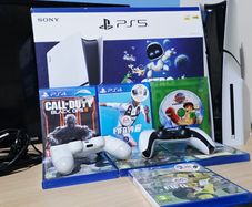 Sony PS5 disc edition with 2 controllers and 7 games