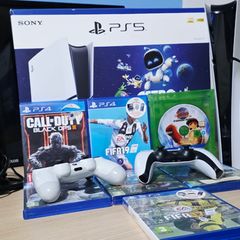 Sony PS5 disc edition with 2 controllers and 7 games