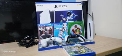 Sony PS5 disc edition with 2 controllers and 7 games