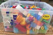 Box of Lego. 4 Figures and 4 Small Base Plates