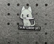 Cat with knife enamel pin