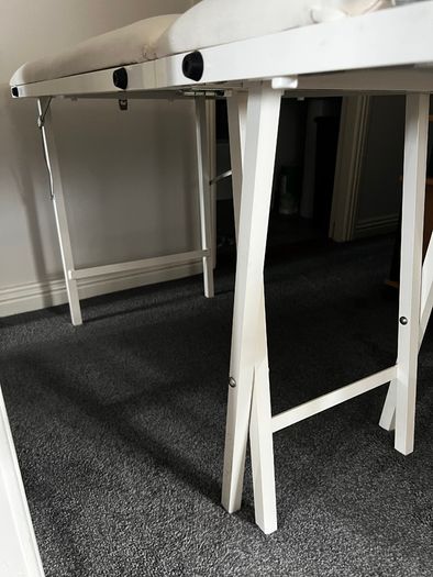 Massage table