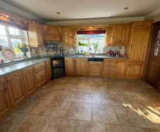 Maple Kitchen with Velstone Worktops  2,000 ono