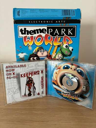 Mixed PC gaming lot: official Sidewinder controller and games, incl. big-box Theme Park World