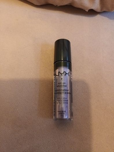 NYX  roll on shimmer  make up for eyes face or body