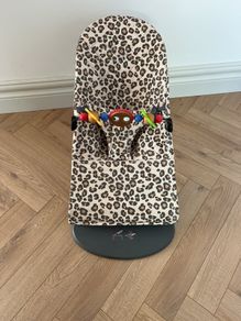 Leopard Baby Bjorn Bouncer with Toy Bar