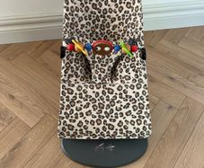 Leopard Baby Bjorn Bouncer with Toy Bar