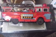 a vintage tin  1950  fire truck made in japan