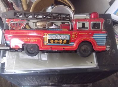 a vintage tin  1950  fire truck made in japan