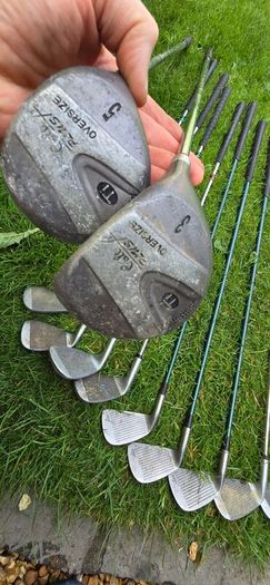 selection of golf clubs.